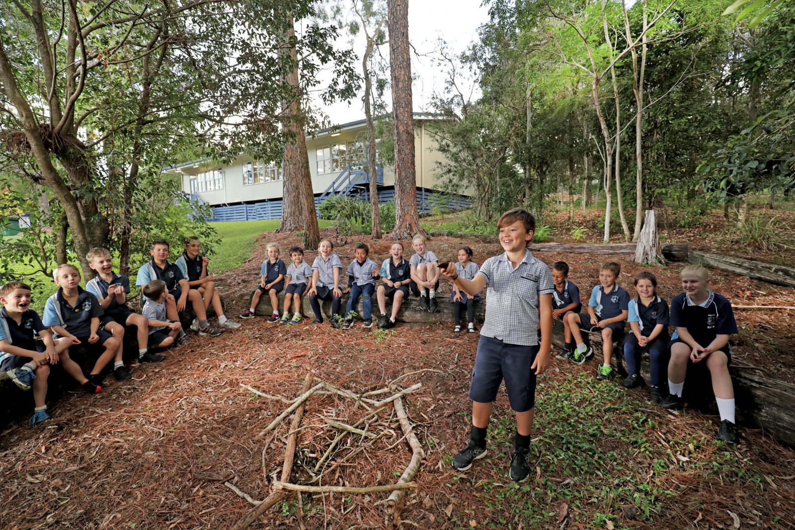 image of boys in forest classroom