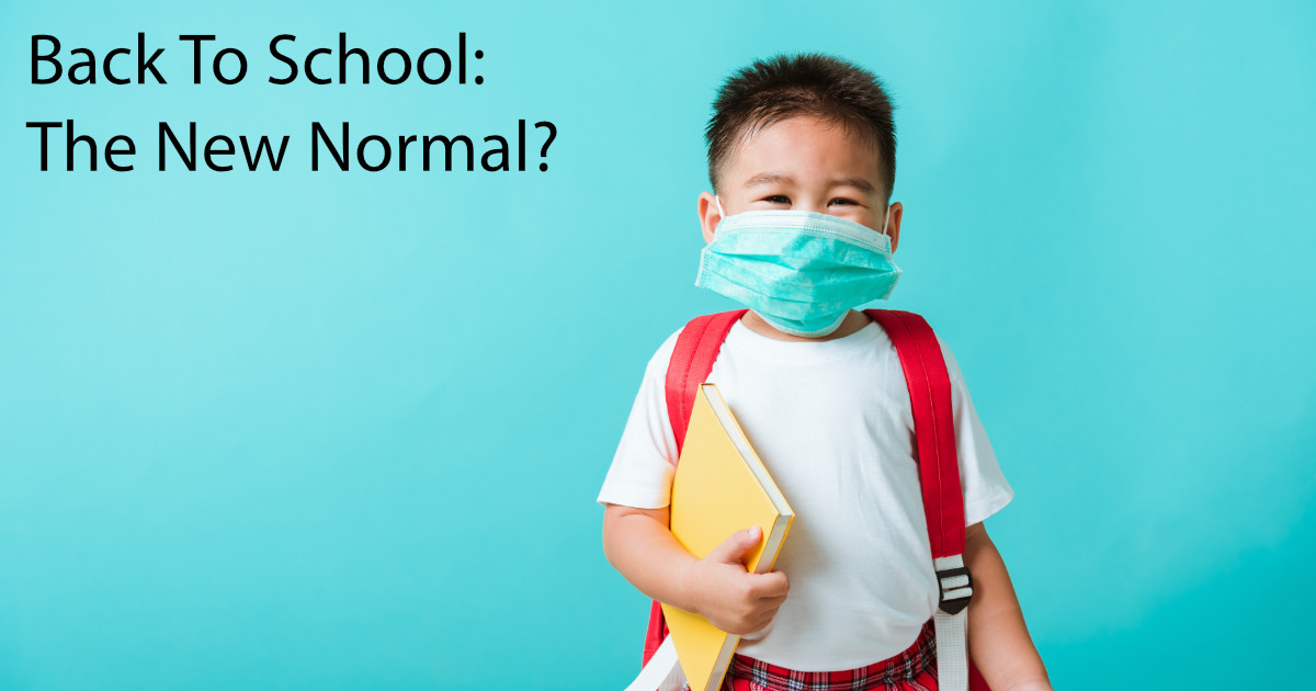 image of boy holding book and wearing face mask with text in upper left "back to school, the new normal"